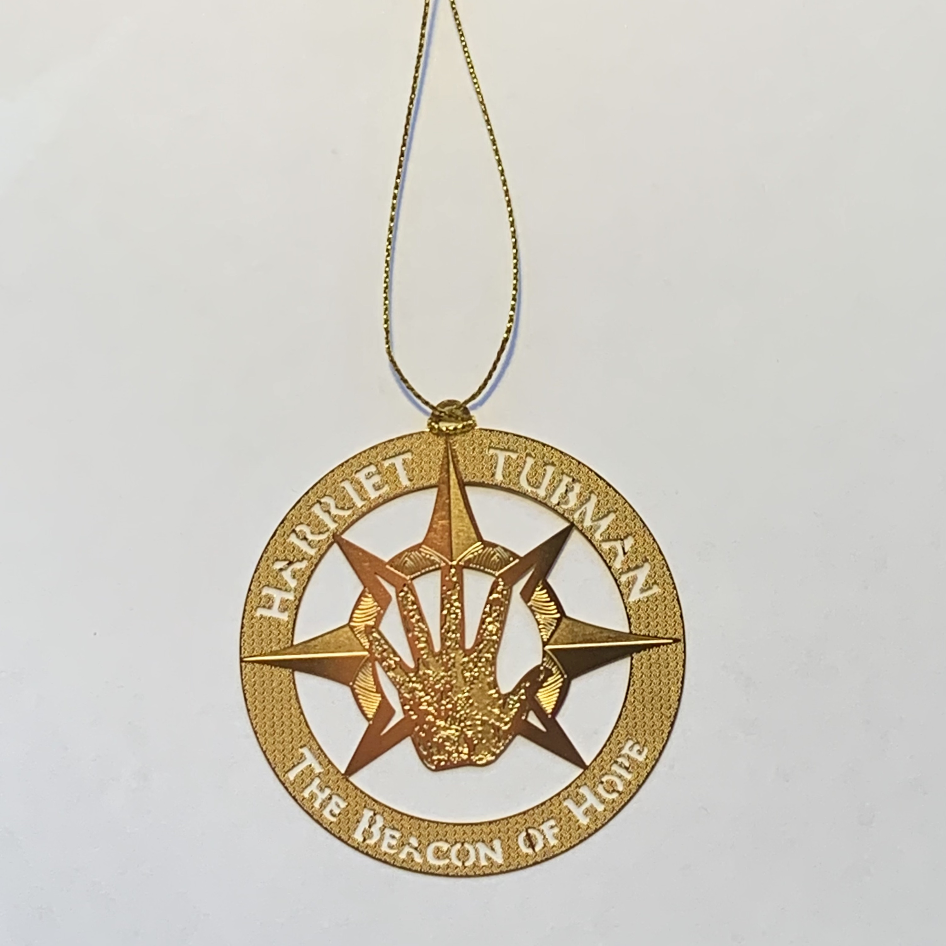 "Be the Beacon"- Harriet's Star Ornament-Gold Metal "Be the Beacon"- Harriet's Star Ornament-Gold Metal